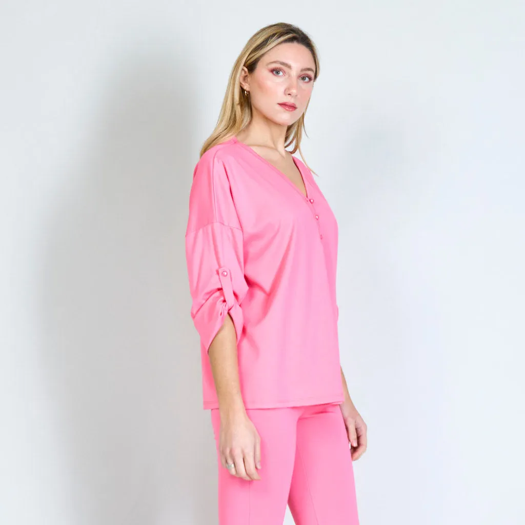 Blouse with buttoned pearls wholesale