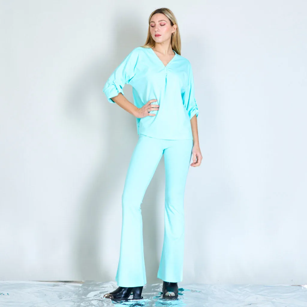 Blouse with buttoned pearls wholesale