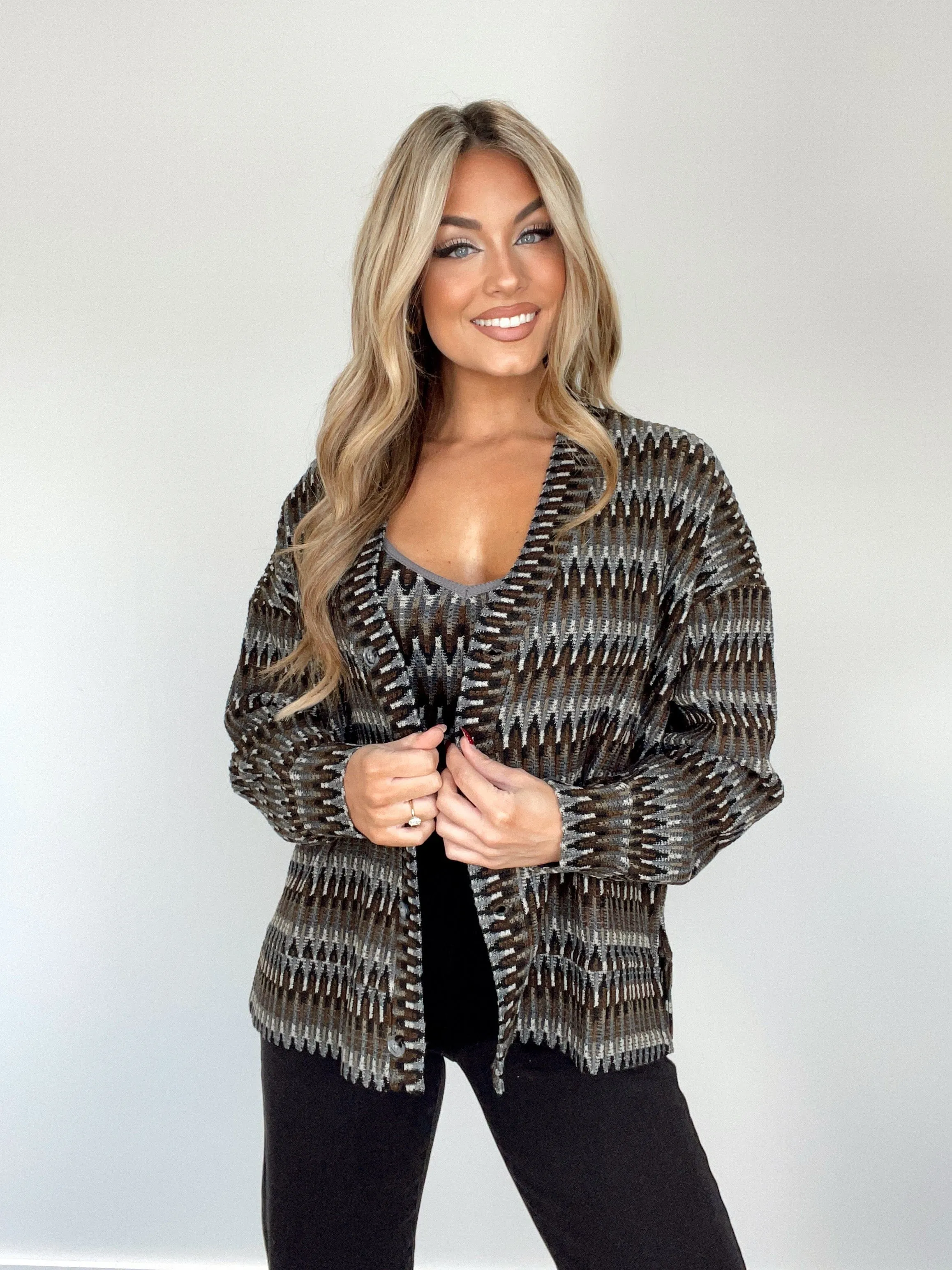 Sure, the optimized title for this e-commerce product could be: Stylish Estelle Knit Cardigan.
